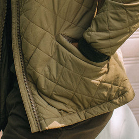 fit model with his hand in the side pockets of The Vertical Jacket in Khaki