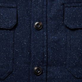 material shot of jacket showing close up of placket