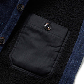 material shot of jacket inside showing interior buttoned pocket