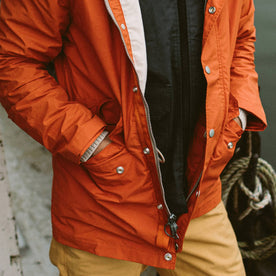 fit model with hands in pocket of The Dalton Jacket in Rust