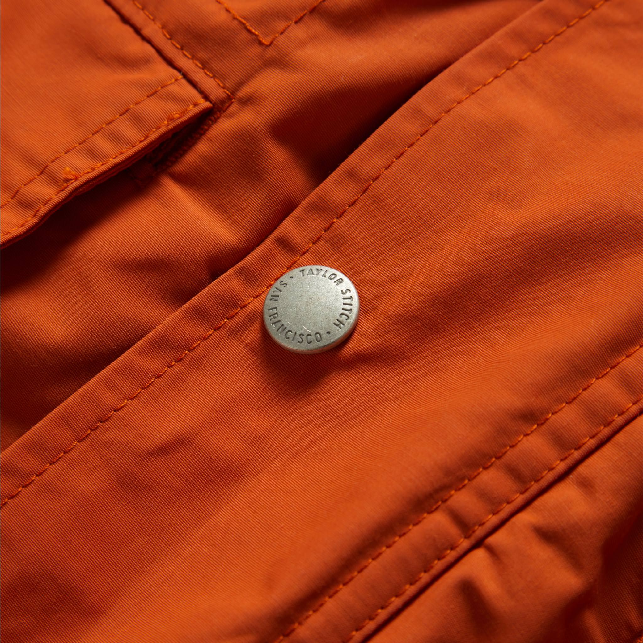 material shot of front placket and button of The Dalton Jacket in Rust, Outerwear by Taylor Stitch