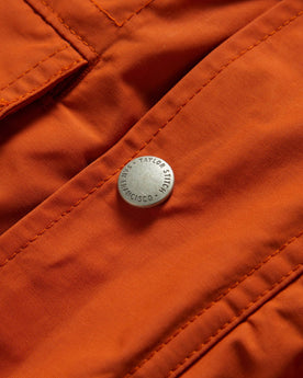 material shot of front placket and button of The Dalton Jacket in Rust, Outerwear by Taylor Stitch