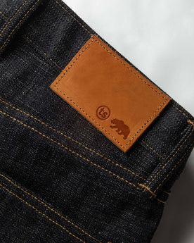 material shot of leather patch, Bottoms by Taylor Stitch