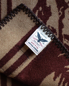 material shot of The Golden State Blanket in Rust's Pendleton tag, Accessories by Taylor Stitch