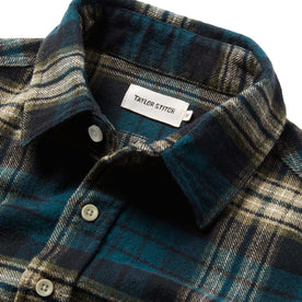 material shot of The Ledge Shirt in Deep Sea Plaid showing label