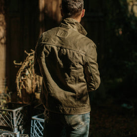 fit model wearing The Ryder Jacket in Yoshiwa Mills Olive from the back showing yoke