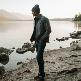 fit model wearing The Lined Utility Shirt in Indigo and Slate Twill in front of a lake