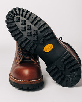 flatlay of The Backcountry Boot in Taylor Stitch Custom, showing the vibram lug soles