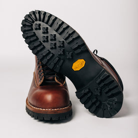 flatlay of The Backcountry Boot in Taylor Stitch Custom, showing the vibram lug soles