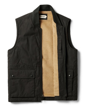 flatlay of The Ignition Vest in Coal Dry Wax open, Outerwear by Taylor Stitch