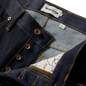 material shot of the button fly on The Slim Jean in Cone Mills Cordura Denim