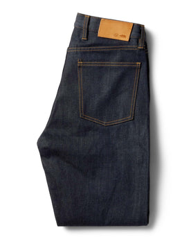flatlay of the back of The Slim Jean in Cone Mills Cordura Denim folded, Bottoms by Taylor Stitch