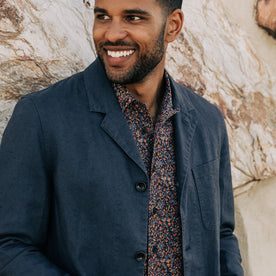 our fit model wearing The Gibson Jacket in Navy—smiling