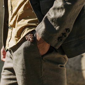our fit model wearing The Gibson Trouser in Gravel—hand in pocket