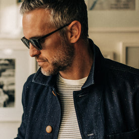 our fit model rocking The Ojai Jacket in Indigo Herringbone—cropped shot looking left