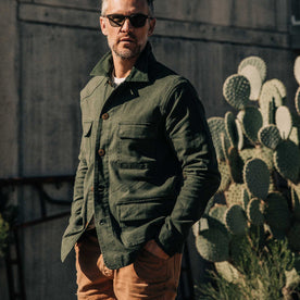 out fit model wearing The Project Jacket in Olive Boss Duck