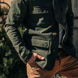 out fit model wearing The Project Jacket in Olive Boss Duck