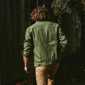 our fit model wearing The Long Haul Jacket in Washed Olive Herringbone