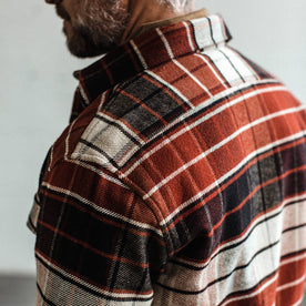 Our fit model wearing The Crater Shirt in Rust Plaid