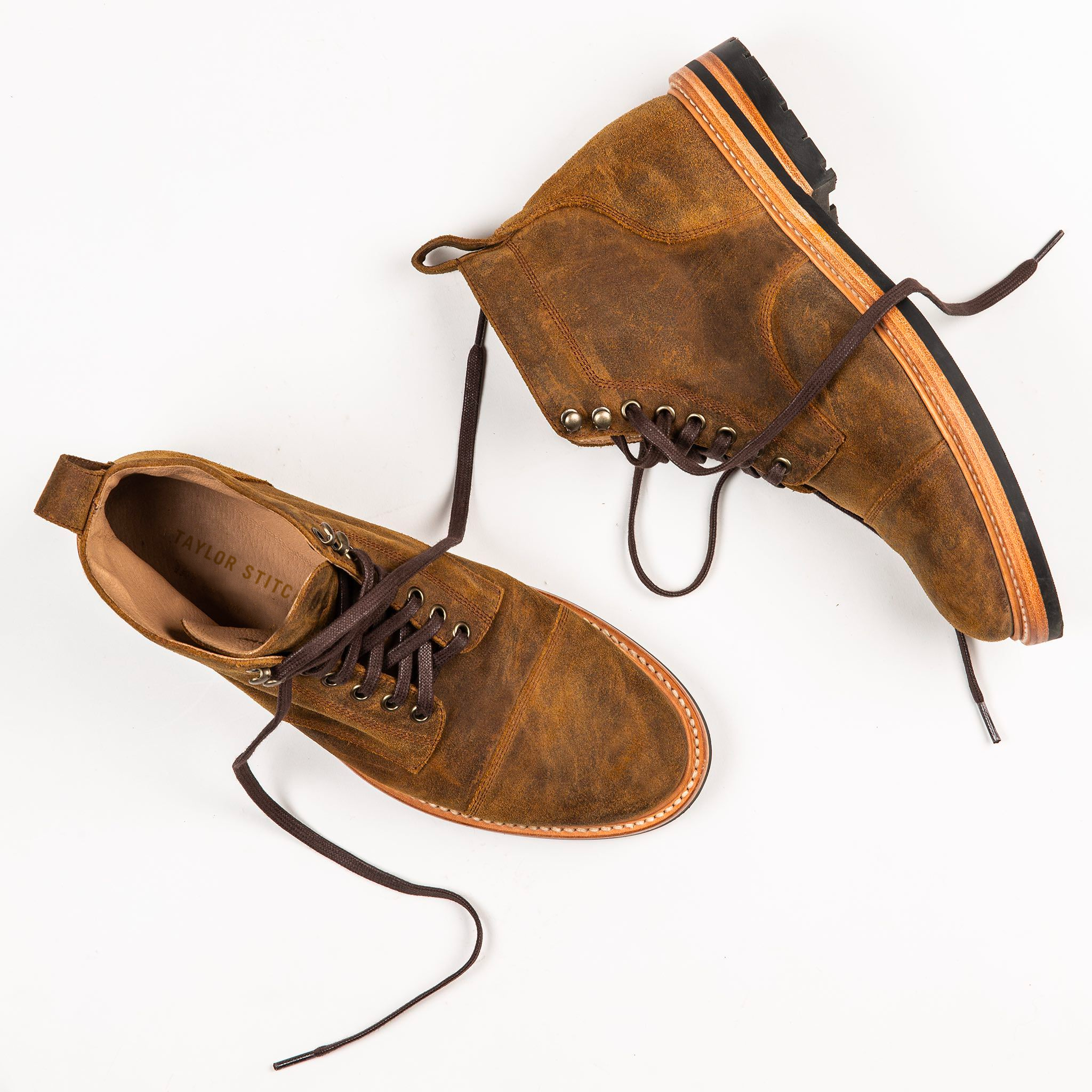 flatlay of The Moto Boot in Golden Brown Waxed Sued, Footwear by Taylor Stitch