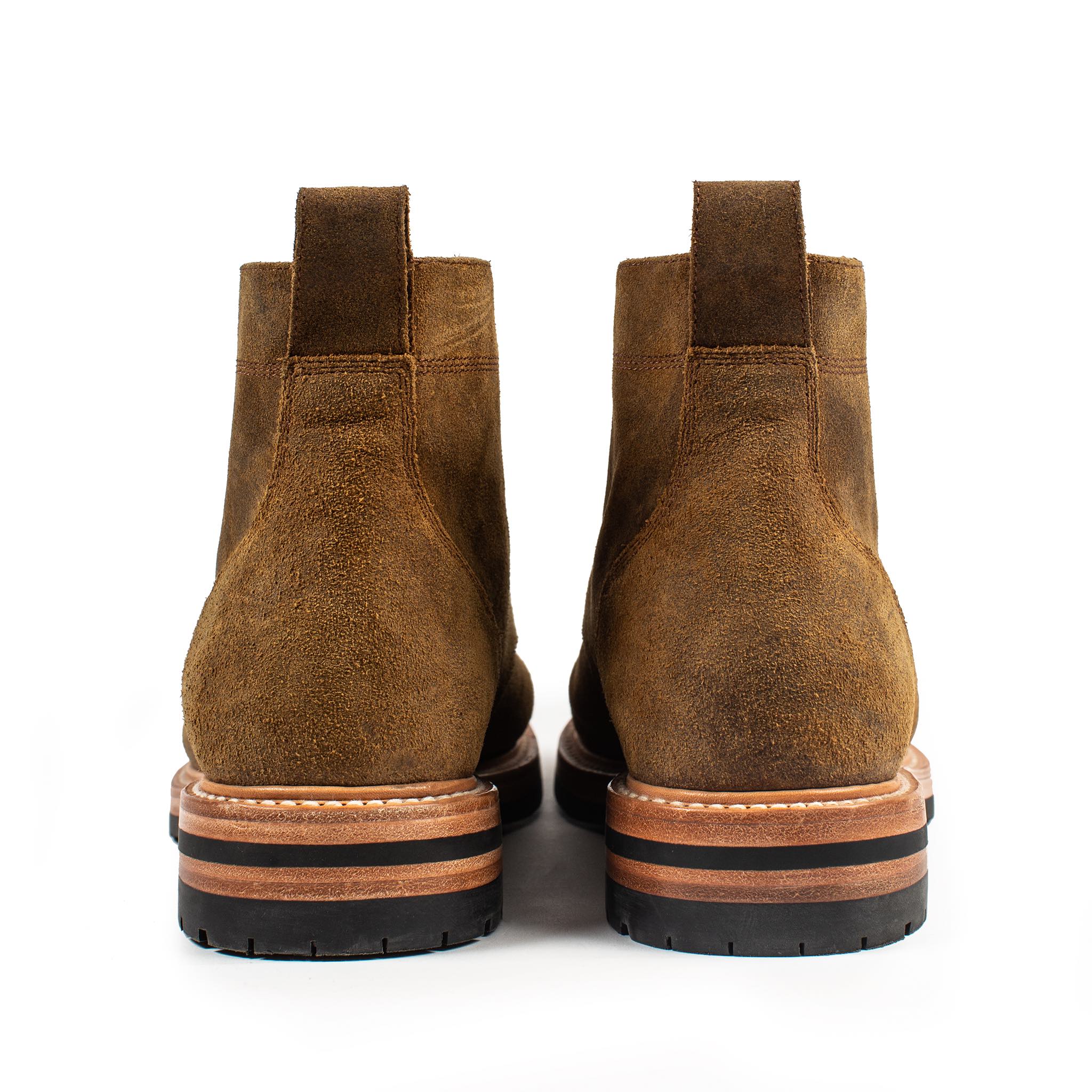 flatlay of The Moto Boot in Golden Brown Waxed Suede, shown from the back, Footwear by Taylor Stitch