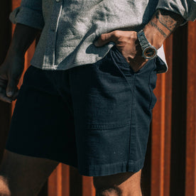 our fit model wearing The Trail Short in Navy Slub Sateen—cropped shot of left side