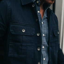 fit model wearing The HBT Jacket in Washed Navy, shot of chest
