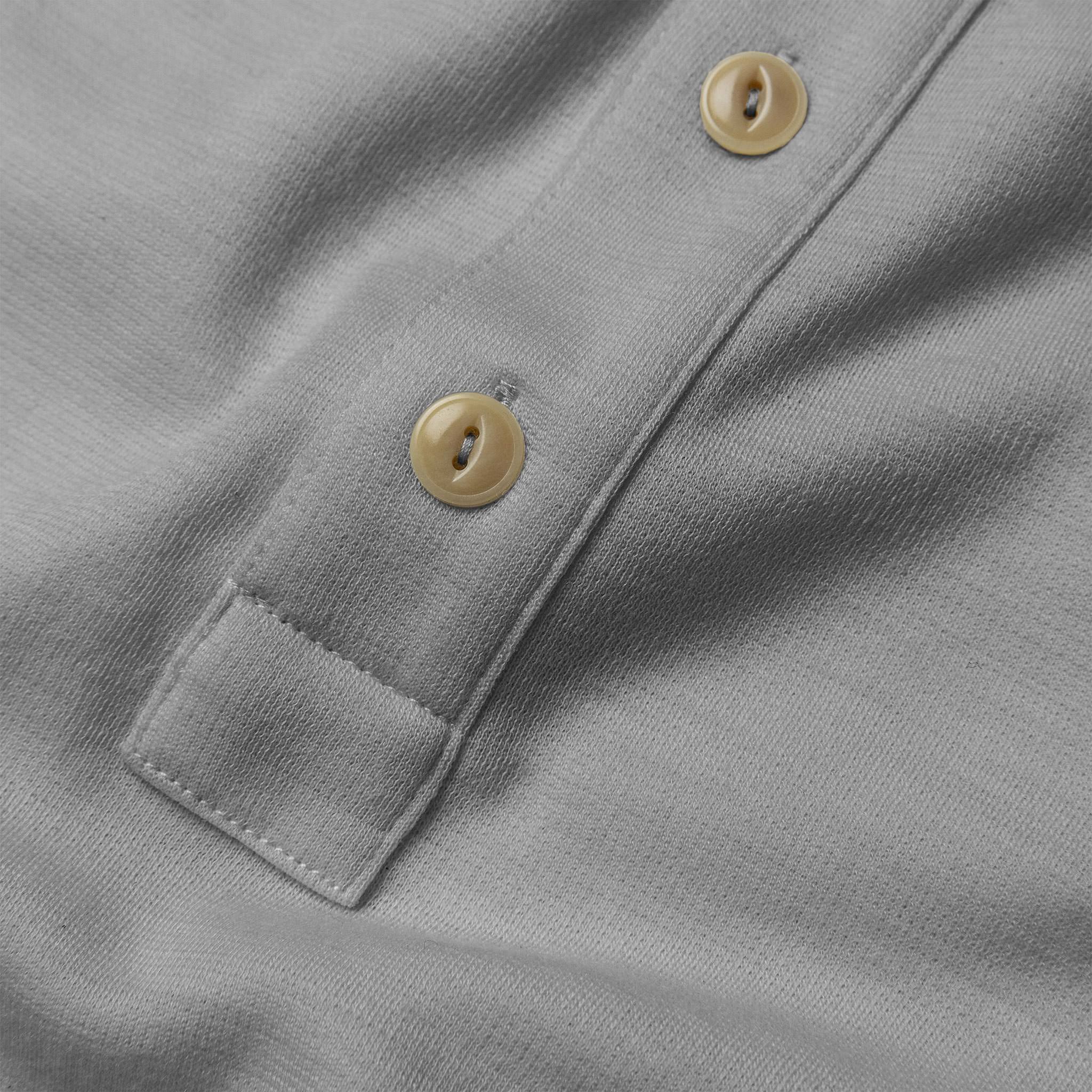 material shot of button, Knits by Taylor Stitch