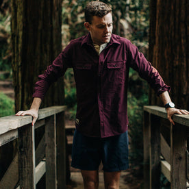 fit model wearing The Over Shirt in Wine, on bridge
