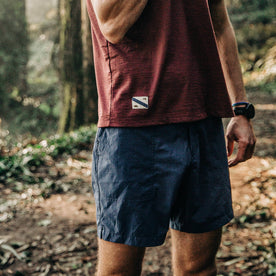 fit model wearing The Traverse Short in Navy, cropped shot