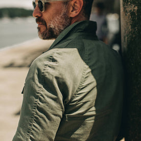 fit model wearing The Lombardi Jacket in Olive Dry Wax,back