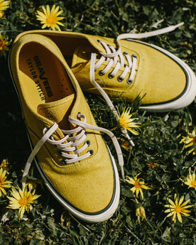 material shot of sneakers in grass, Footwear by Taylor Stitch