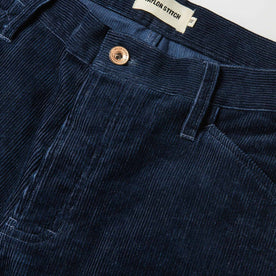 material shot of The Camp Pant in Indigo Corduroy—button and pocket shot