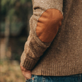 our fit model wearing The Hardtack Sweater in Oak Donegal—closeup of left elbow leather patch