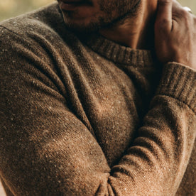 our fit model wearing The Hardtack Sweater in Oak Donegal—closeup of right bicep with cuff and collar visible