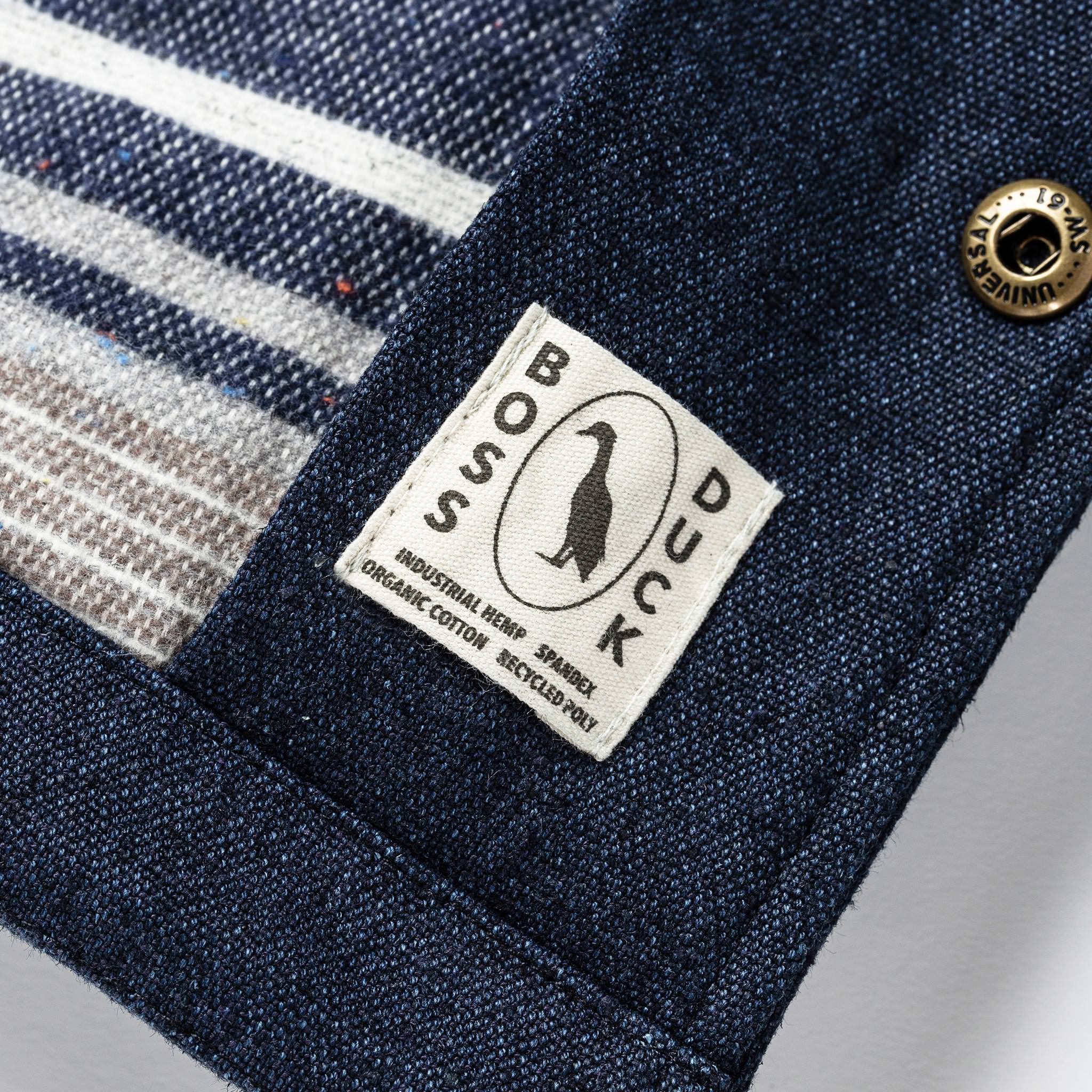 material shot of boss duck logo, Outerwear by Taylor Stitch