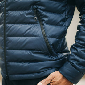 out fit model wearing The Taylor Stitch x Mission Workshop Farallon Jacket in Midnight Blue—material closeup of side zipper