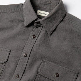 material shot of The Corso Shirt in Charcoal Double Cloth from the front with placket, collar, and chest pockets visible