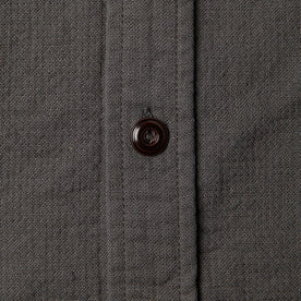 material shot of The Corso Shirt in Indigo Double Cloth closeup of the placket horn button