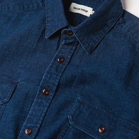 material shot of The Corso Shirt in Indigo Double Cloth from the front showing placket, collar, and chest pockets